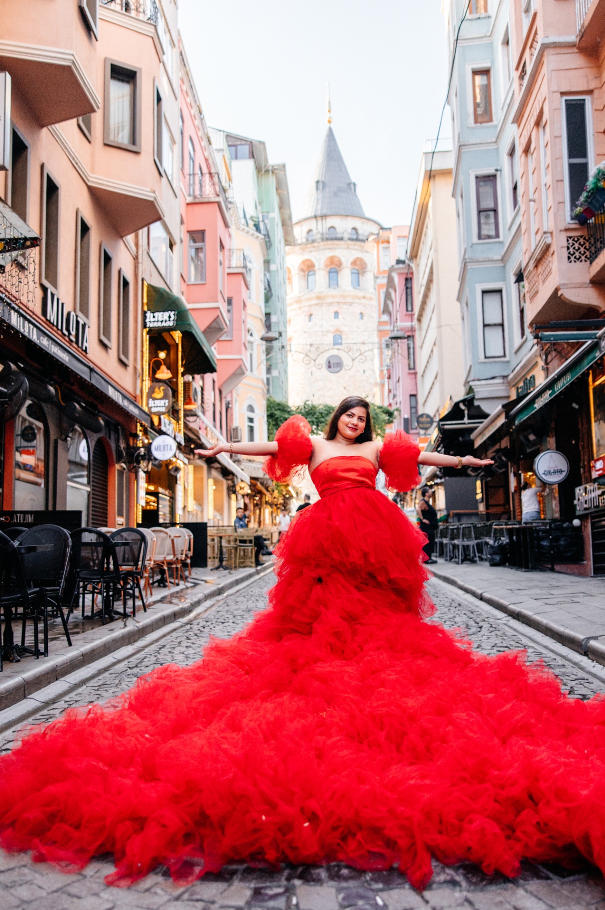 Jyoti in a red gown by Galata Tower